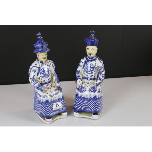 15 - Two Chinese Blue and White Figures of Seated Emperors, character marks to base, 33cm high