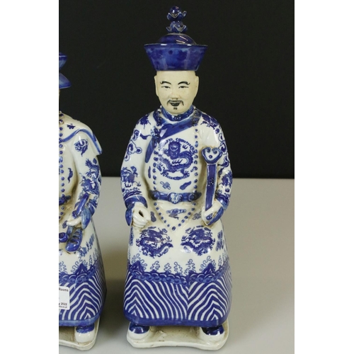15 - Two Chinese Blue and White Figures of Seated Emperors, character marks to base, 33cm high