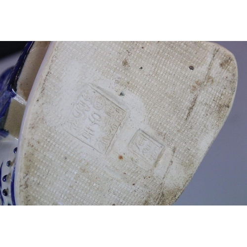15 - Two Chinese Blue and White Figures of Seated Emperors, character marks to base, 33cm high
