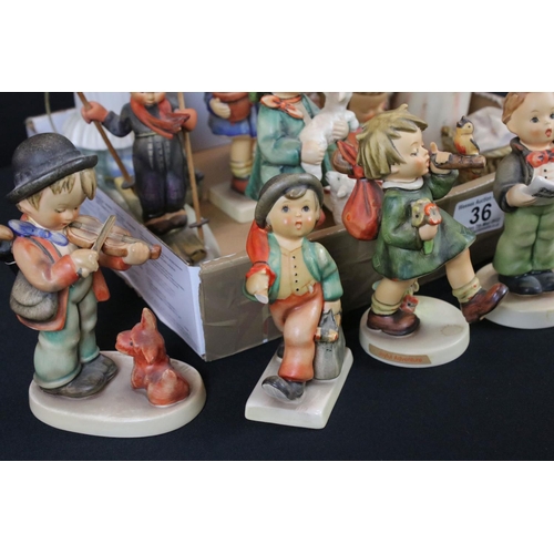 36 - Eleven Goebel Hummel Figures, tallest 15cm together with Royal Doulton Medium D'Artagnan Character J... 