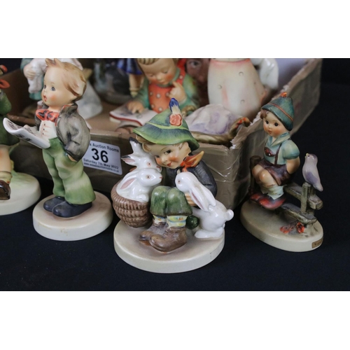 36 - Eleven Goebel Hummel Figures, tallest 15cm together with Royal Doulton Medium D'Artagnan Character J... 