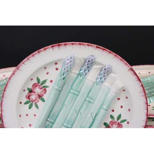 38 - Set of Twelve French Faience Asparagus Plates, each with moulded relief decoration of seven asparagu... 