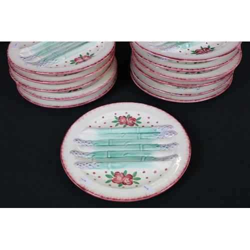 38 - Set of Twelve French Faience Asparagus Plates, each with moulded relief decoration of seven asparagu... 