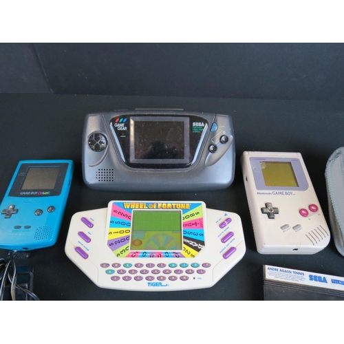 253 - Retro Gaming - Four handheld games consoles to include Nintendo Gameboy & Gameboy Color with 9 x gam... 