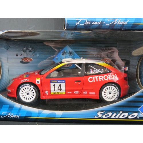 460 - Five boxed 1:18 diecast models to include 2 x Maisto (Peugeot 307 WRC, Mclaren F1) & 3 x Solido (202... 