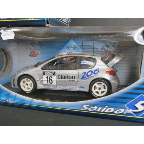 460 - Five boxed 1:18 diecast models to include 2 x Maisto (Peugeot 307 WRC, Mclaren F1) & 3 x Solido (202... 