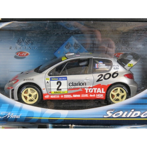 460 - Five boxed 1:18 diecast models to include 2 x Maisto (Peugeot 307 WRC, Mclaren F1) & 3 x Solido (202... 