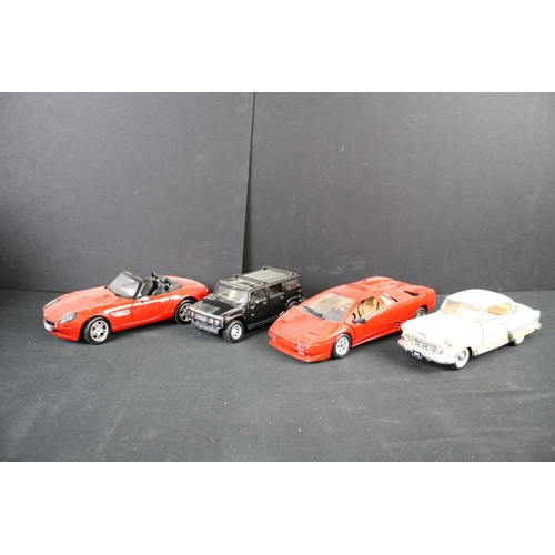 497 - 26 Diecast models, mainly 1:18 to 1:24 scale to include Burago, Polistil, Solido etc, 4 with display... 