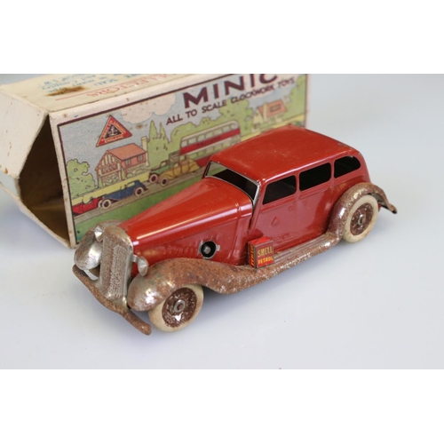 283 - Two boxed Triang Minic clockwork models to include Vauxhall Open Tourer in green and Vauxhall in red... 