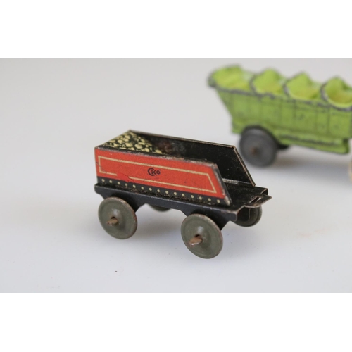 283 - Two boxed Triang Minic clockwork models to include Vauxhall Open Tourer in green and Vauxhall in red... 