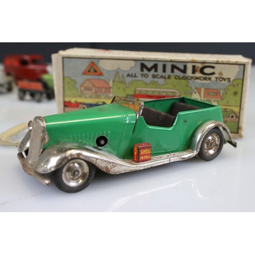 283 - Two boxed Triang Minic clockwork models to include Vauxhall Open Tourer in green and Vauxhall in red... 