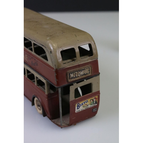 284 - Triang Minic clockwork tin plate bus with Bovril / Ovaltine decals, showing wear, plus a tin plate c... 