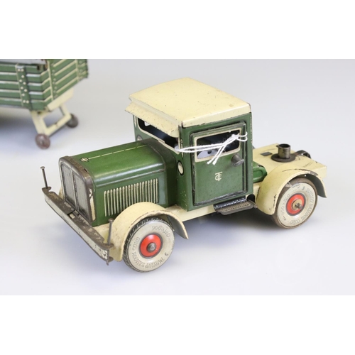 285 - Tippco tin plate truck & trailer with original cover in green & cream, showing paint loss, gd overal... 