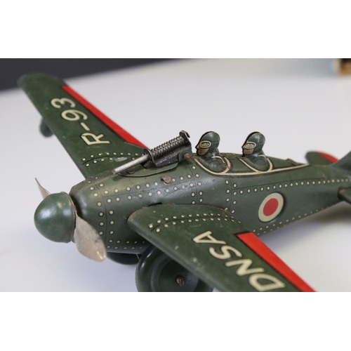 286 - Four tin plate military models to include Takatoku TT wind up DNSA R-93 plane, D365 Tank, clockwork ... 