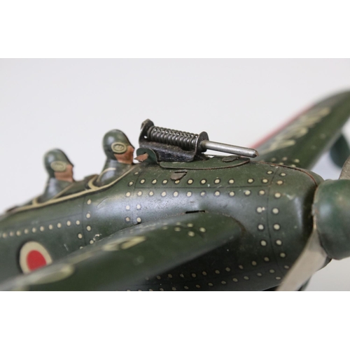 286 - Four tin plate military models to include Takatoku TT wind up DNSA R-93 plane, D365 Tank, clockwork ... 