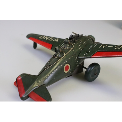 286 - Four tin plate military models to include Takatoku TT wind up DNSA R-93 plane, D365 Tank, clockwork ... 