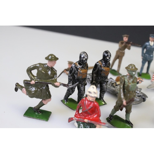 302 - Collection of early-mid 20th C military metal figures, many Britains examples, include Jo Hill motor... 