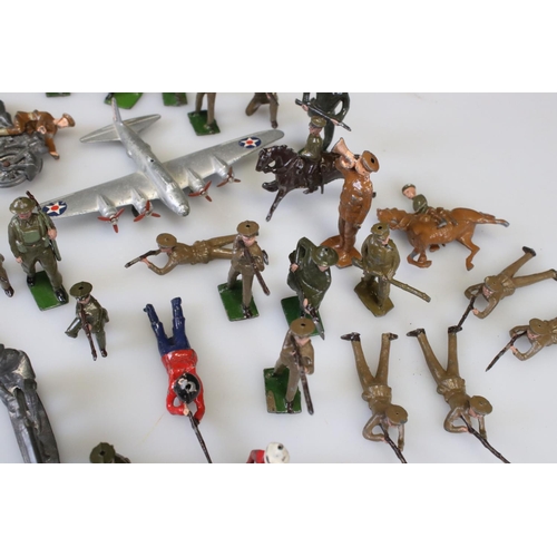 302 - Collection of early-mid 20th C military metal figures, many Britains examples, include Jo Hill motor... 