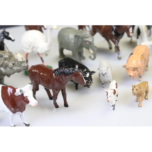 303 - Approximately 24 Painted Metal Farm and Zoo Animals including Britains