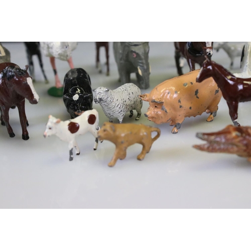 303 - Approximately 24 Painted Metal Farm and Zoo Animals including Britains