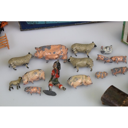 306 - Quantity of metal and plastic animal figures, farming and zoo featuring Britains, a boxed Britains F... 