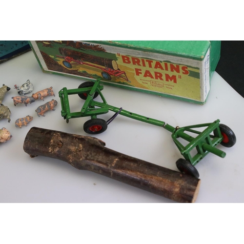 306 - Quantity of metal and plastic animal figures, farming and zoo featuring Britains, a boxed Britains F... 