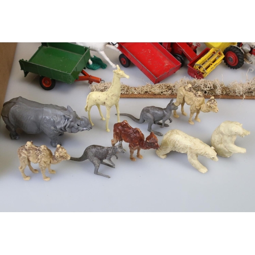 306 - Quantity of metal and plastic animal figures, farming and zoo featuring Britains, a boxed Britains F... 