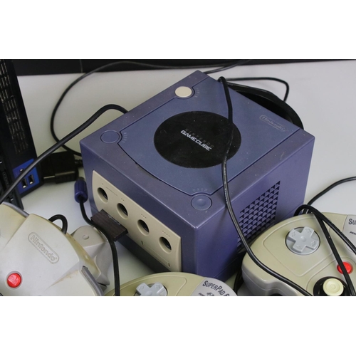 203 - Retro Gaming - Three retro consoles to include N64 with 3 x controllers (1 original, 2 custom), Nint... 