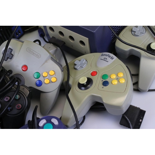 203 - Retro Gaming - Three retro consoles to include N64 with 3 x controllers (1 original, 2 custom), Nint... 