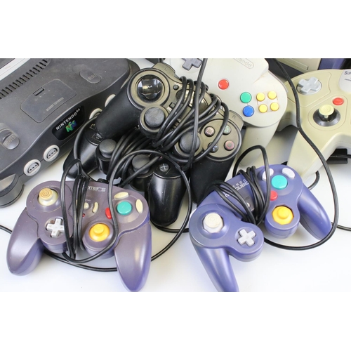 203 - Retro Gaming - Three retro consoles to include N64 with 3 x controllers (1 original, 2 custom), Nint... 