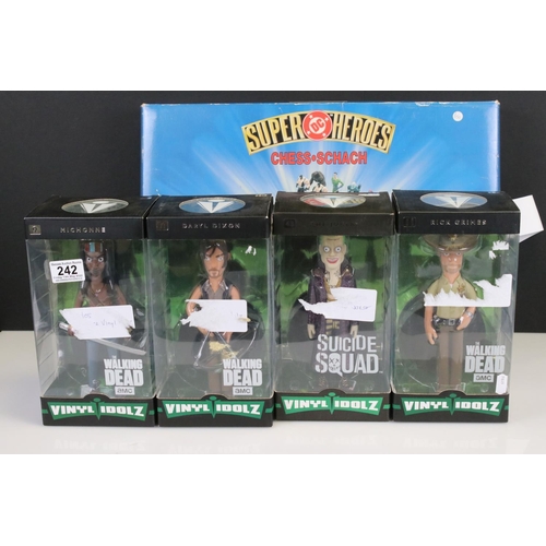 242 - Six boxed comic related collectibles to include 4 x Vinyl Idolz (The Joker, Michonne, Rick Grimes & ... 