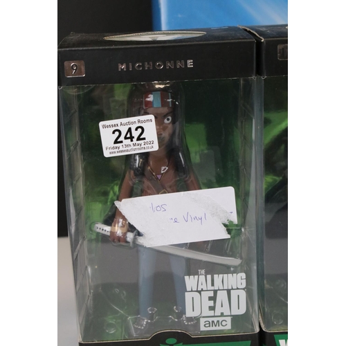 242 - Six boxed comic related collectibles to include 4 x Vinyl Idolz (The Joker, Michonne, Rick Grimes & ... 