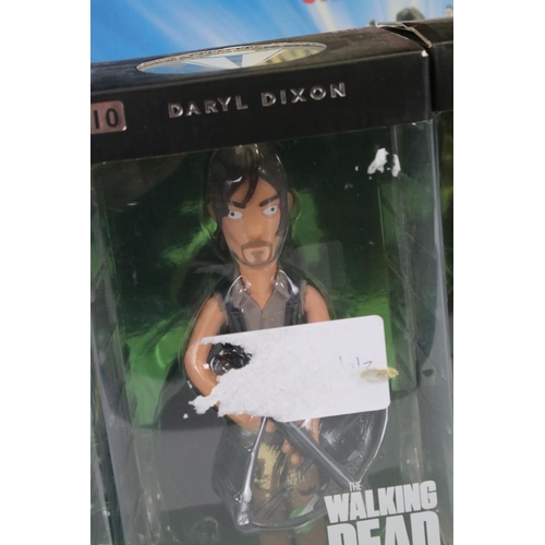 242 - Six boxed comic related collectibles to include 4 x Vinyl Idolz (The Joker, Michonne, Rick Grimes & ... 