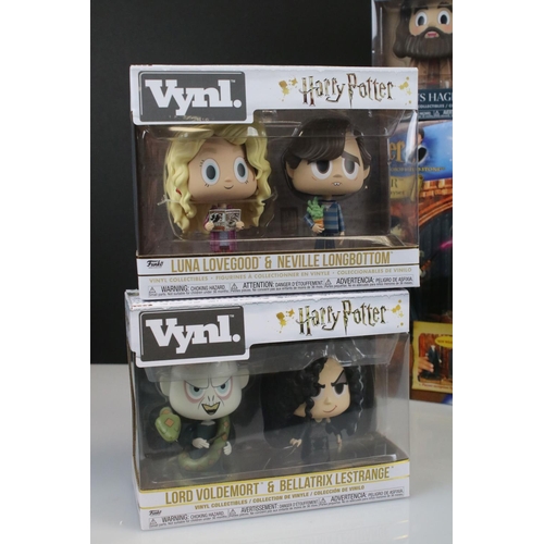 248 - Five boxed Funko Vynl. Harry Potter collectibles to include Rubeus Hagrid & Harry Potter, Dobby & Ha... 