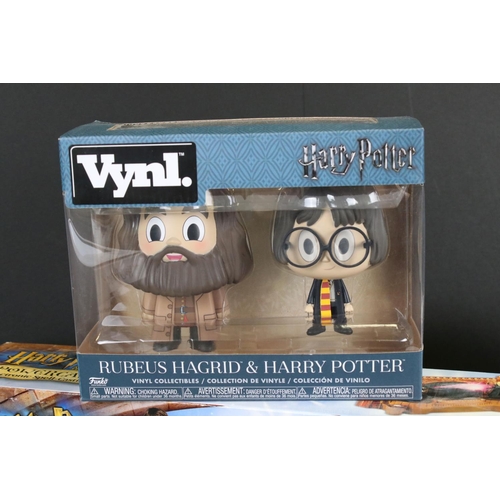 248 - Five boxed Funko Vynl. Harry Potter collectibles to include Rubeus Hagrid & Harry Potter, Dobby & Ha... 