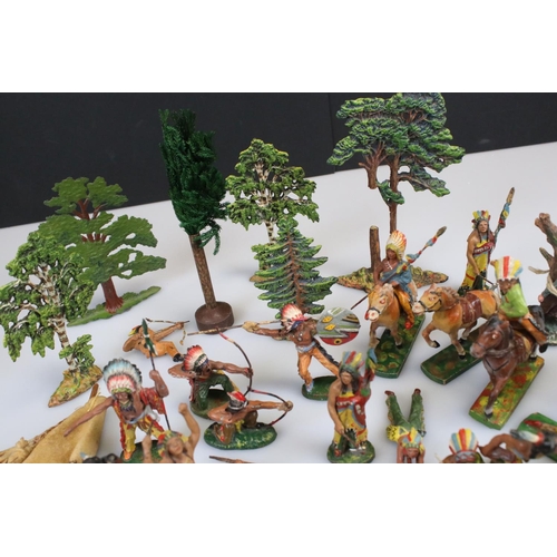 311 - Collection of Elastolin Wild West figures to include Native Americans and horses plus a group of tre... 