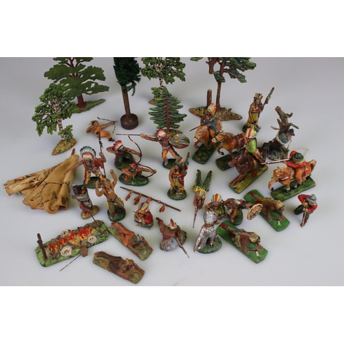 311 - Collection of Elastolin Wild West figures to include Native Americans and horses plus a group of tre... 