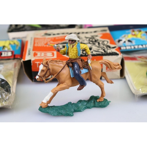 313 - five boxed & bagged Britains plastic figures to include 2 x Swoppets (641 Cowboy Firing Pistol Mount... 