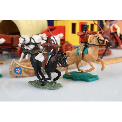 316 - Collection of plastic Timpo Wild West figures and accessories to include 2 x horse drawn wagons, tep... 