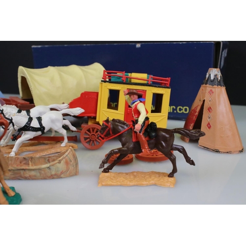 316 - Collection of plastic Timpo Wild West figures and accessories to include 2 x horse drawn wagons, tep... 