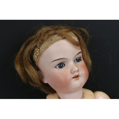 329 - Early 20th C German bisque headed doll, sleeping blue glass eyes, teeth, loose hair, touch of wear t... 