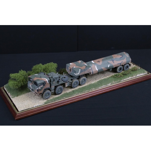 424 - Two cased plastic kit built military models, very well made with diorama scenery, plastic case lengt... 