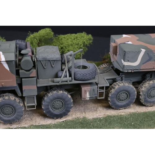 424 - Two cased plastic kit built military models, very well made with diorama scenery, plastic case lengt... 