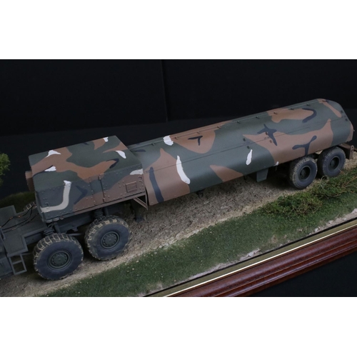 424 - Two cased plastic kit built military models, very well made with diorama scenery, plastic case lengt... 