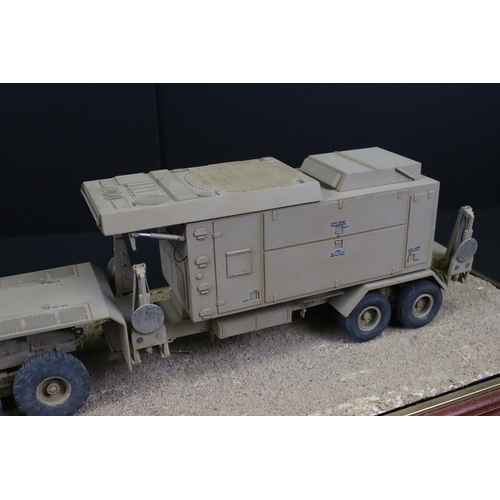 424 - Two cased plastic kit built military models, very well made with diorama scenery, plastic case lengt... 