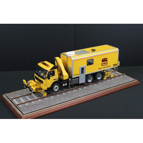 427 - Two cased plastic kit built haulage models, very well made, to include EWS Road Rail Vehicle (case 2... 