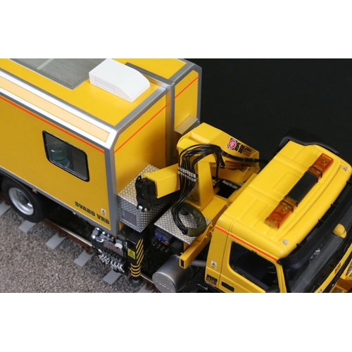 427 - Two cased plastic kit built haulage models, very well made, to include EWS Road Rail Vehicle (case 2... 