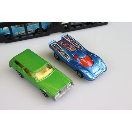 568 - Two Matchbox Carry Cases containing a total of 44 diecast models to include various Matchbox and Cor... 