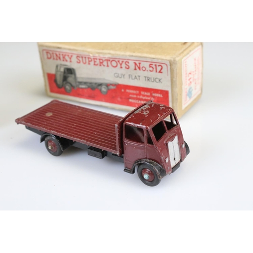 576 - Boxed play worn Dinky Supertoys No 512 Guy Flat Truck diecast model in maroon, a boxed Matchbox 64 C... 