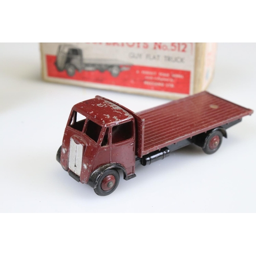 576 - Boxed play worn Dinky Supertoys No 512 Guy Flat Truck diecast model in maroon, a boxed Matchbox 64 C... 